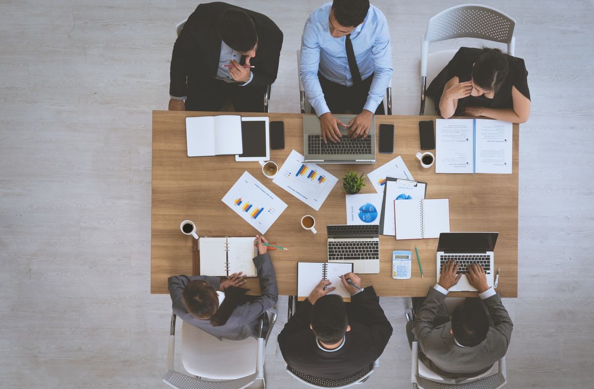 Group of business colleague people meeting discussing to work at office,Top View